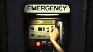 The phone from Alien Isolation with the player character's hand on the switch