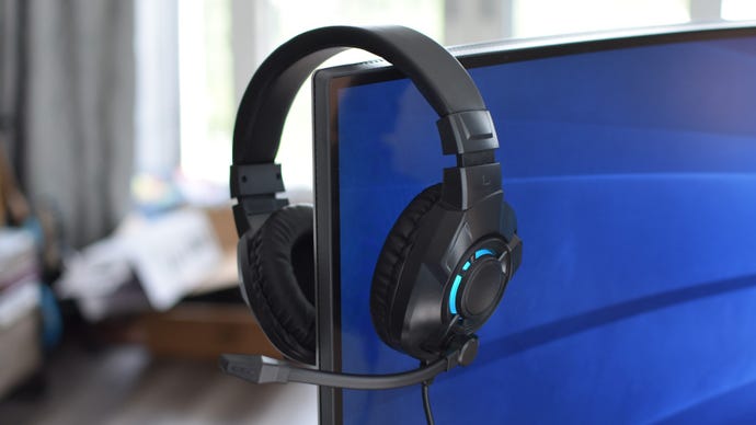 The Asda Tech gaming headset, hung on the edge of a monitor.